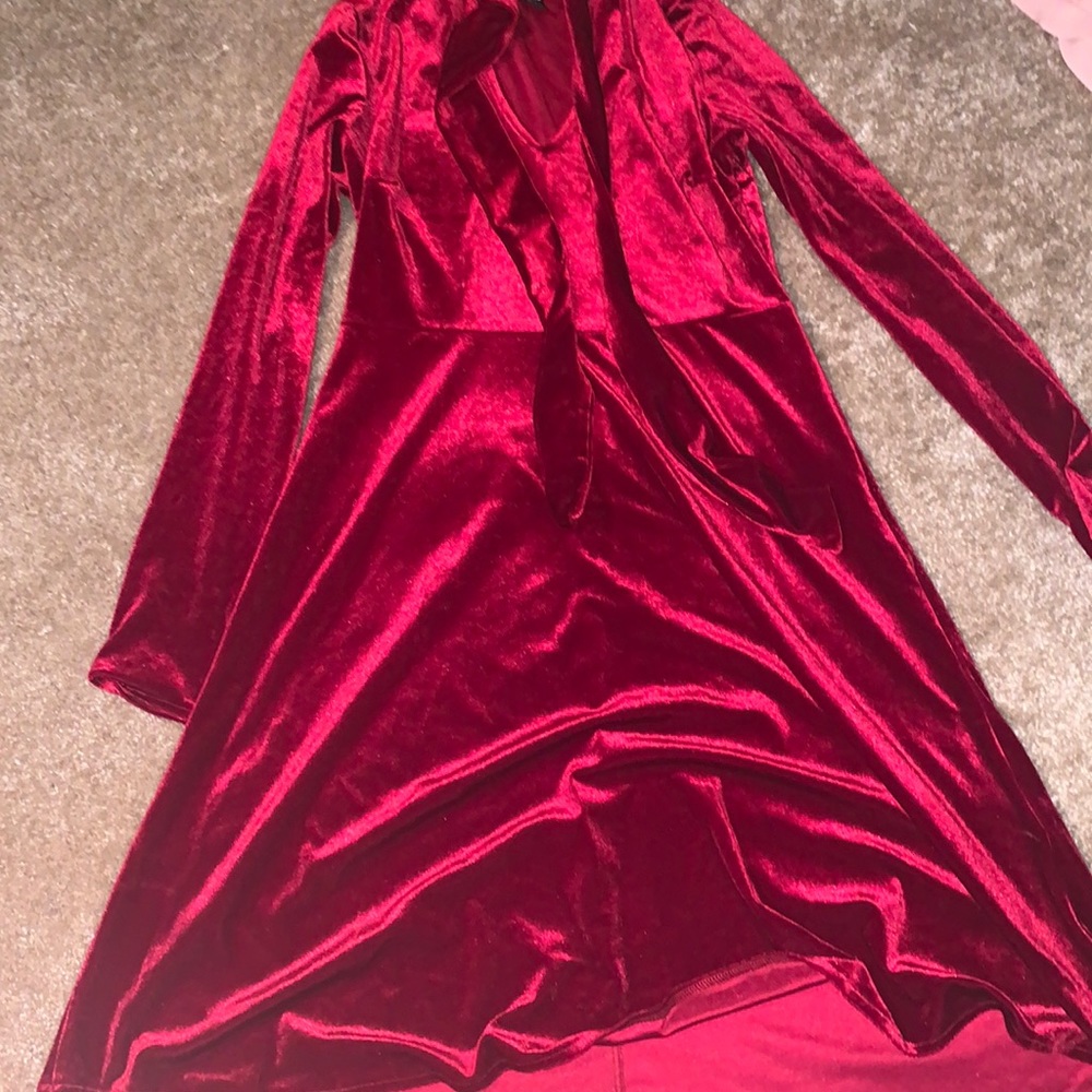 A red dress, with strings that tie up in a bow.